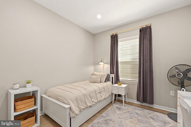 bedroom with light wood-type flooring