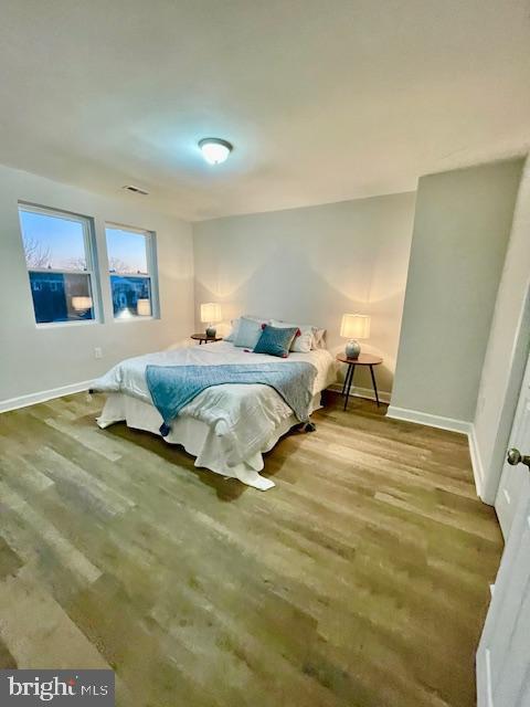 bedroom featuring hardwood / wood-style floors