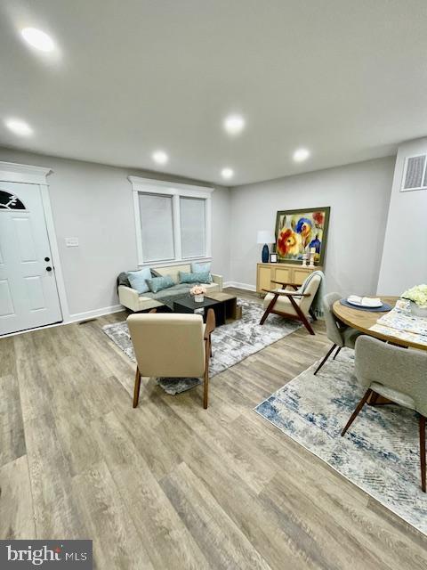 living room with hardwood / wood-style floors