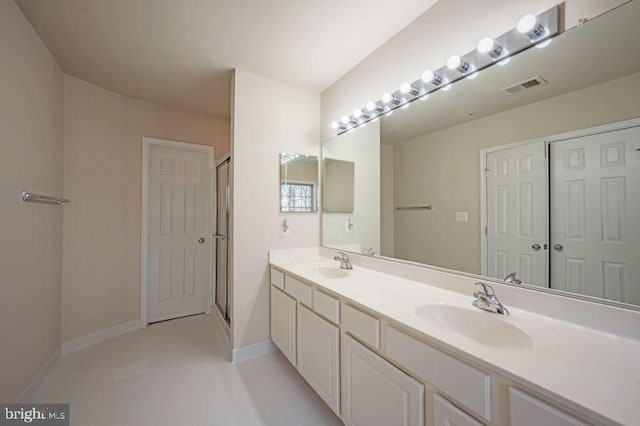 bathroom featuring vanity and walk in shower