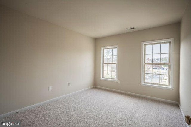 view of carpeted spare room