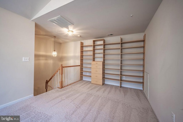 basement featuring light colored carpet