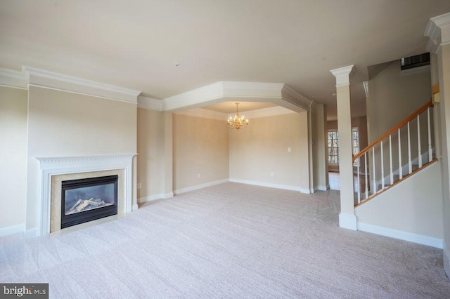 unfurnished living room with crown molding, an inviting chandelier, and carpet floors