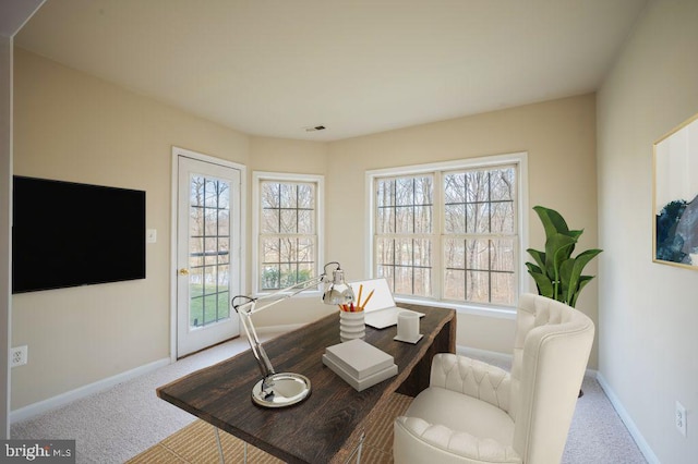 view of carpeted dining room