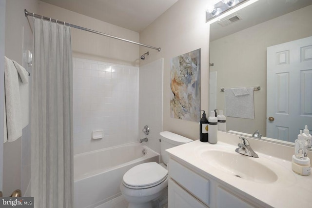 full bathroom featuring vanity, toilet, and shower / bath combo