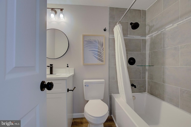 full bathroom featuring vanity, toilet, and shower / bath combo with shower curtain