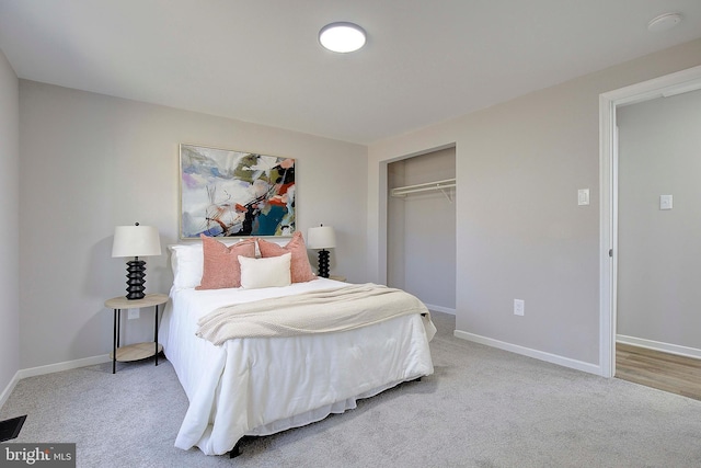 carpeted bedroom featuring a closet