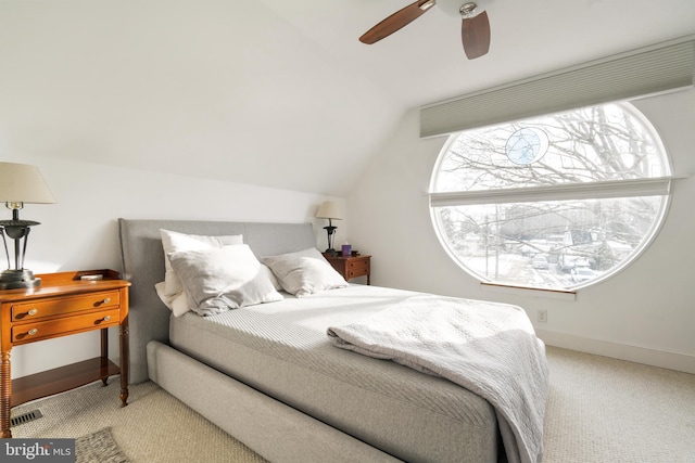 bedroom featuring vaulted ceiling, ceiling fan, and carpet