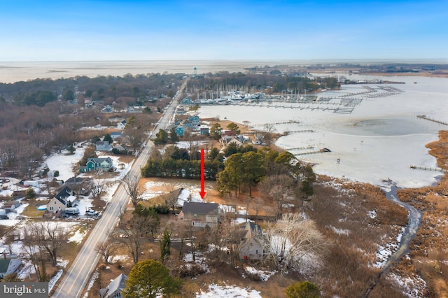 drone / aerial view with a water view