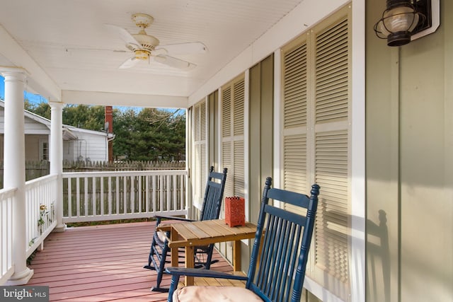 deck featuring ceiling fan and a porch