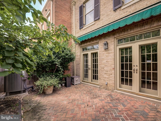 view of patio / terrace with french doors and cooling unit