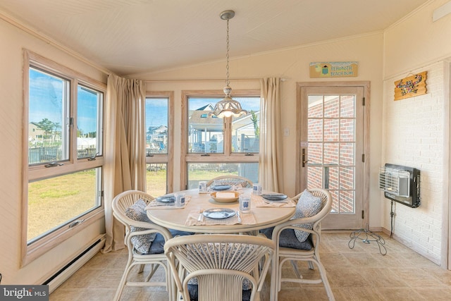 sunroom featuring vaulted ceiling and a baseboard radiator