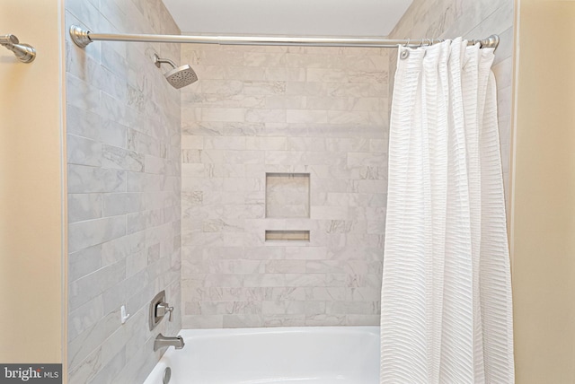 bathroom with shower / bath combo