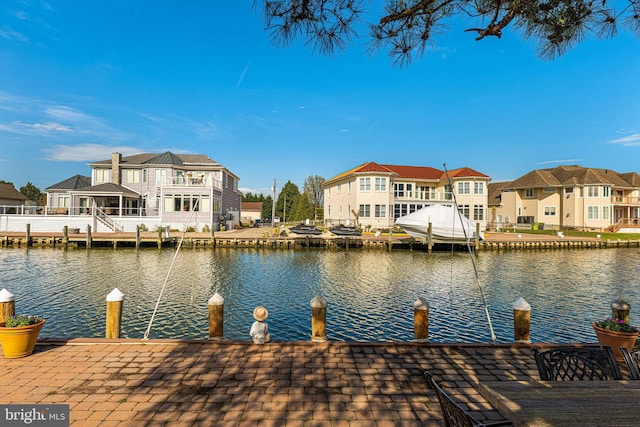 dock area with a water view