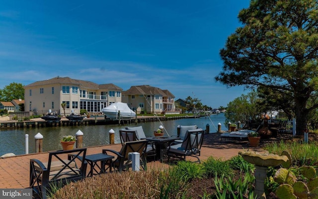 dock area with a water view