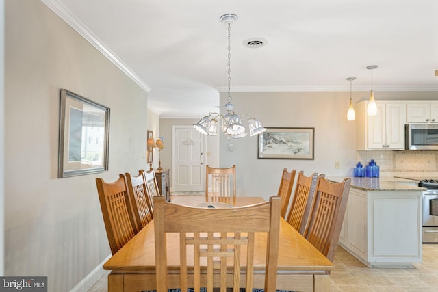 dining area with crown molding