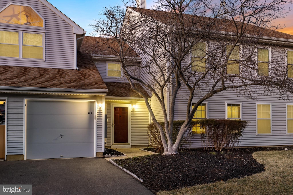 view of front of house with a garage