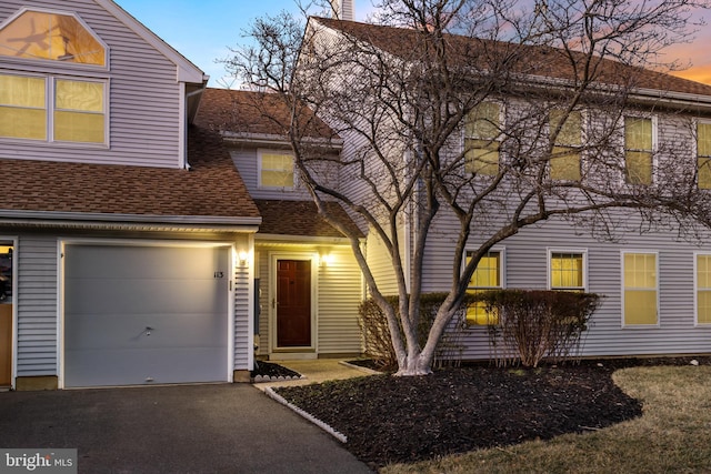 view of front of house with a garage