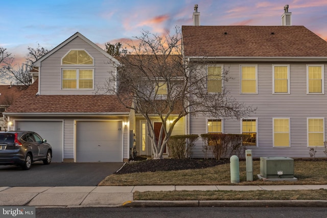 view of front of property featuring a garage