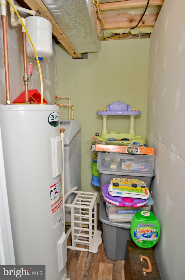 utility room with electric water heater