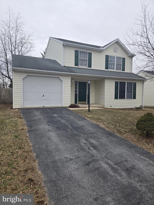 front of property featuring a garage