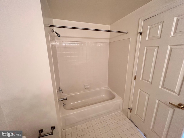 bathroom featuring tile patterned flooring and shower / bathing tub combination