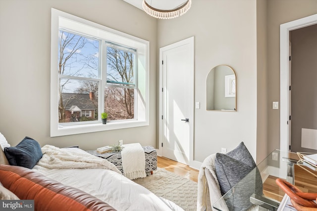 bedroom with light wood-type flooring