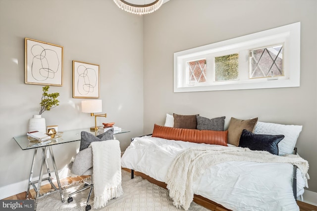 bedroom featuring wood-type flooring