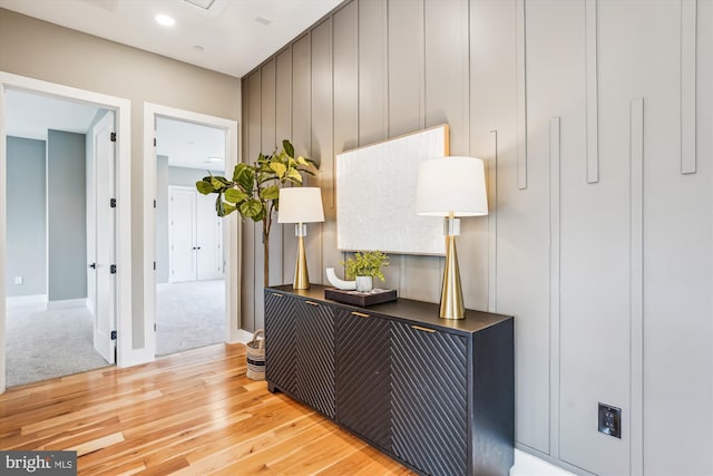 corridor featuring light hardwood / wood-style floors