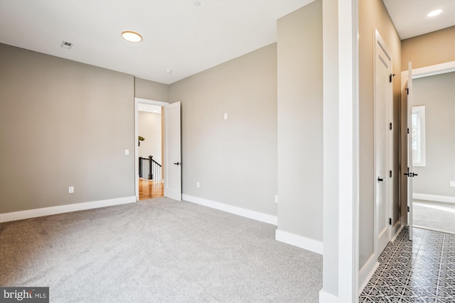 view of carpeted spare room