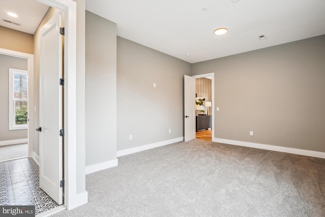 view of carpeted spare room