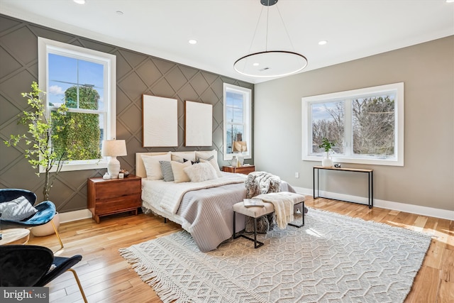 bedroom with light hardwood / wood-style flooring