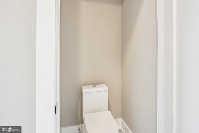 bathroom featuring toilet