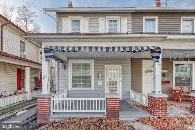 view of front of house featuring covered porch