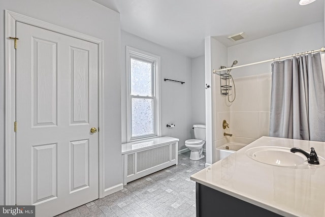 full bathroom with vanity, radiator, shower / bath combination with curtain, and toilet