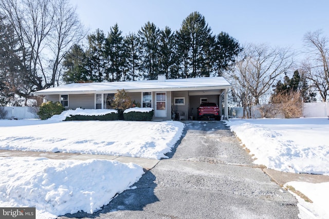 single story home with a carport