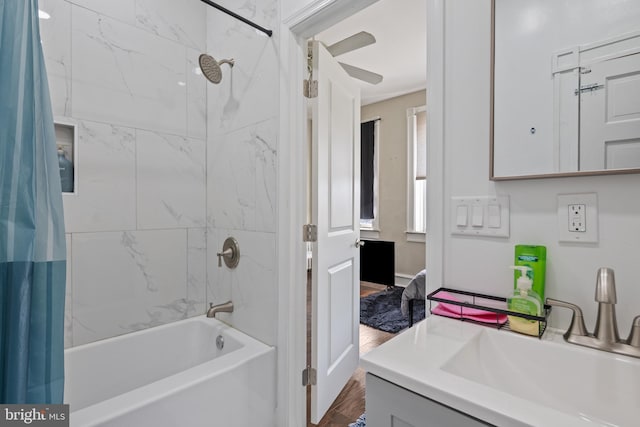 bathroom featuring shower / tub combo with curtain and vanity