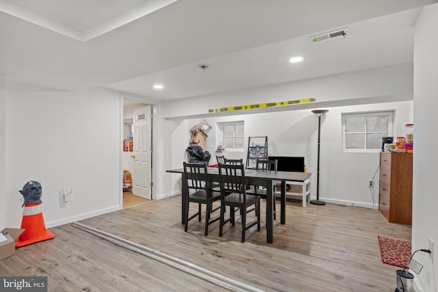 dining space featuring light hardwood / wood-style floors