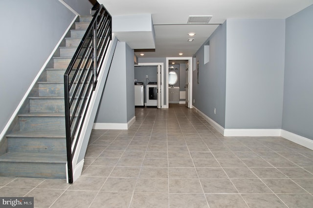 staircase with tile patterned flooring