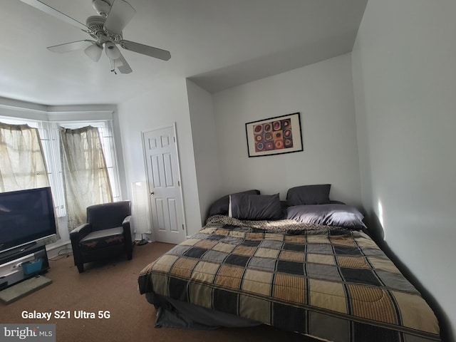 bedroom with ceiling fan and carpet floors