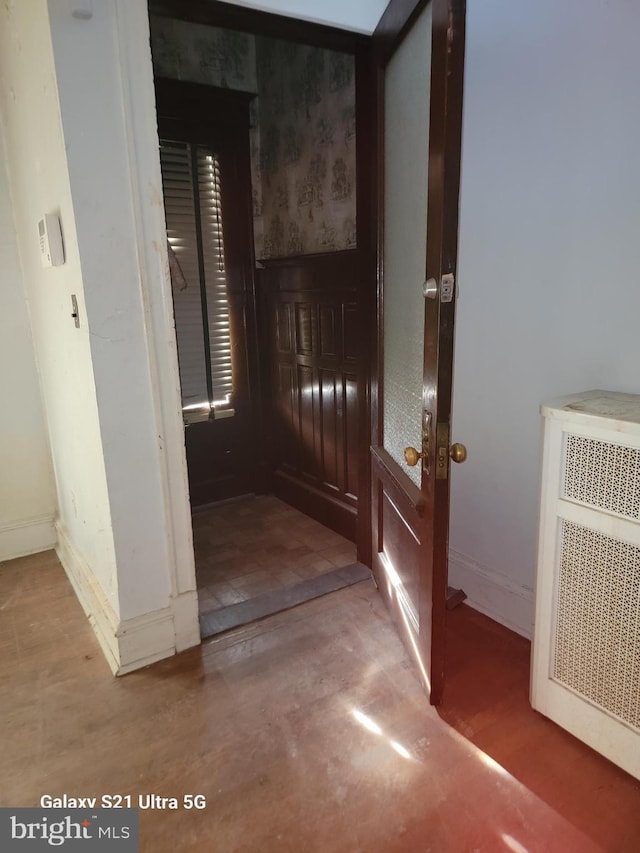 hall featuring radiator heating unit