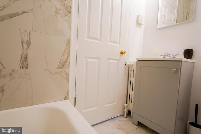 bathroom featuring vanity and a bathtub