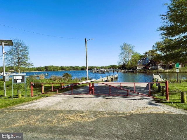 dock area featuring a water view