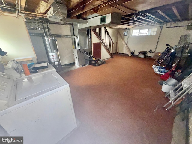 basement with washer / clothes dryer and gas water heater