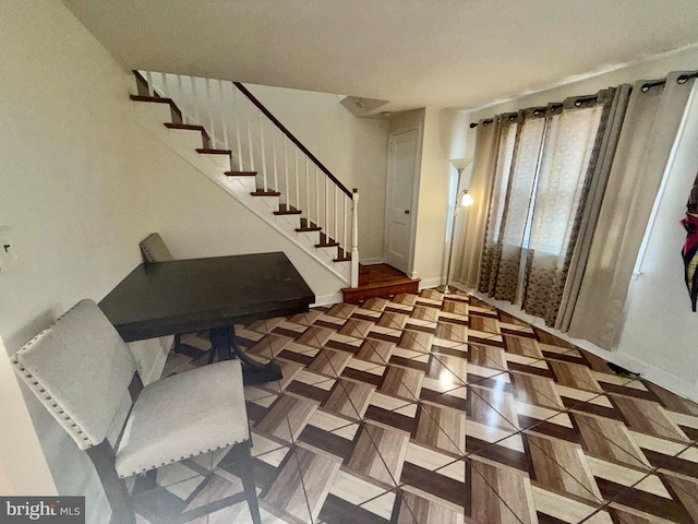 foyer featuring parquet floors