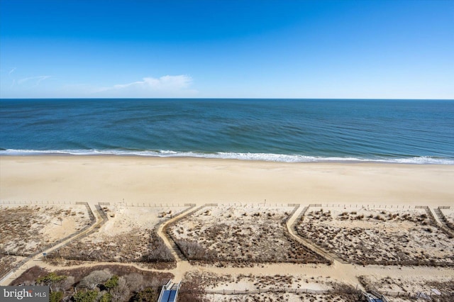 view of water feature with a beach view