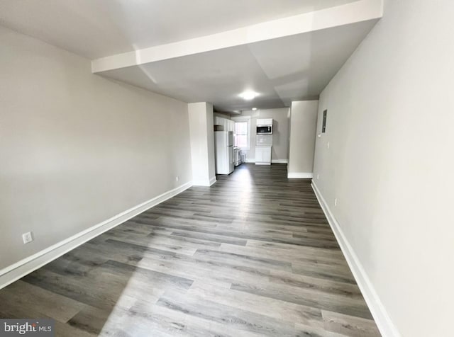 unfurnished living room featuring hardwood / wood-style floors