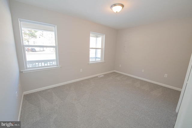 view of carpeted spare room