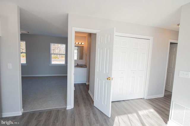 hall featuring light hardwood / wood-style floors