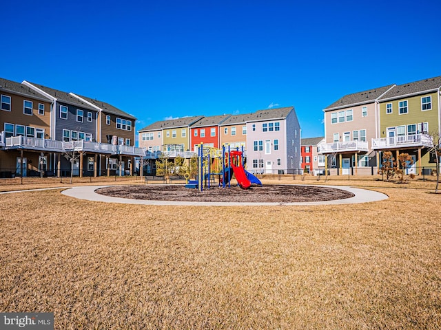 view of playground featuring a lawn